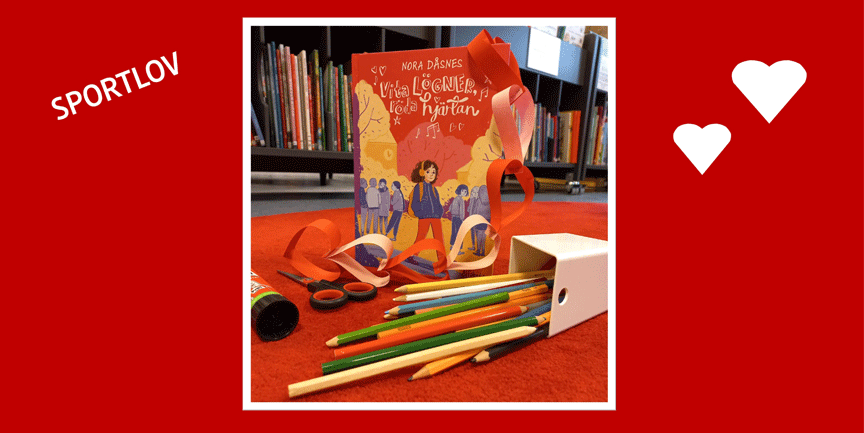 Färgpennor, sax, lim och en bok.